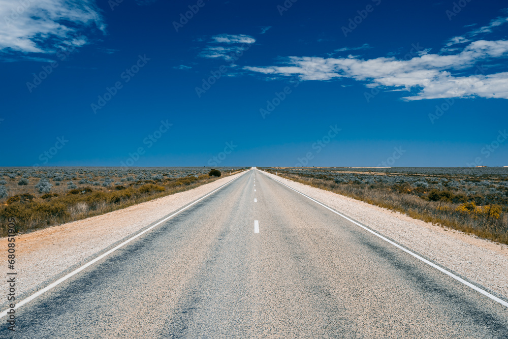 Long empty road through Nullarbor in South Australia
