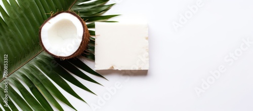 Summer fruit of Brown whole coconut, half and green leaf white background. AI generated