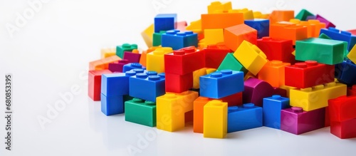 Colorful plastic blocks toy isolated on white background. AI generated image photo