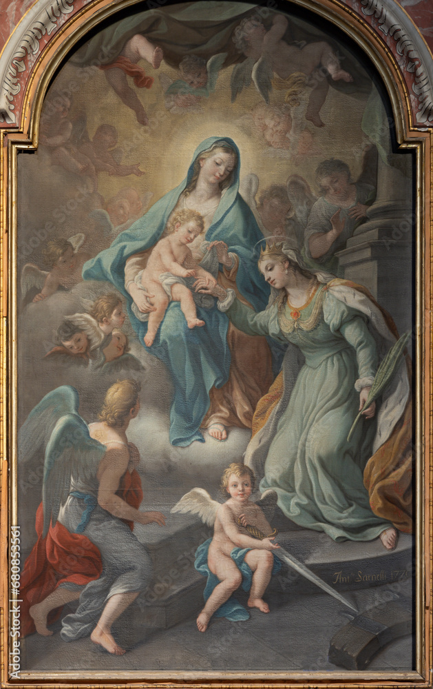 NAPLES, ITALY - APRIL 20, 2023: The painting of Madonna with the St. Catherine of Alexandria in the church Chiesa di Santa Caterina a Chiaia by Antonio Sarnelli (1770).