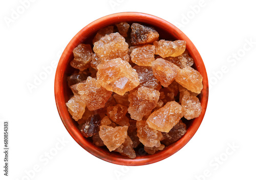 Cubes of organic palm tree rock sugar candy in a bowl isolated on a transparent background, Clipping path included