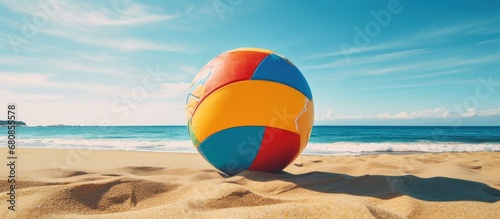 Close up colorful beach ball at seaside on sunny day view AI generated image