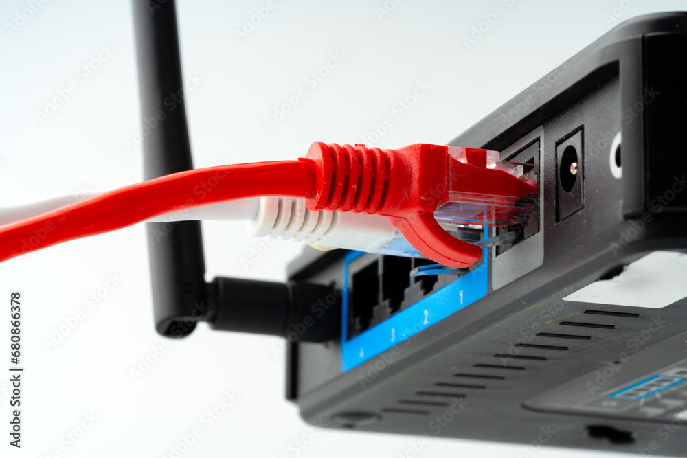 Modern router with cables plugged in close up