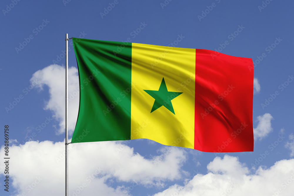 Obraz premium Senegal flag fluttering in the wind on sky.