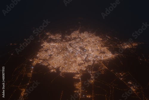 Aerial view on Baghdad (Iraq) from north. Top view on modern city at night from space
