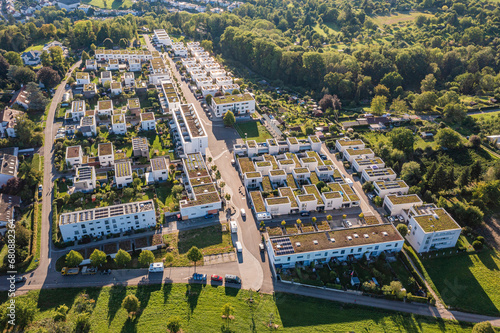 Germany, Baden-Wurttemberg, Esslingen, Aerial view of modern energy efficient suburb in summer photo