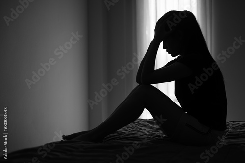 Silhouette of a woman with symptoms of depression and depression, Sadness, Anxiety, Family Problems, Mentally ill Person, Domestic Violence