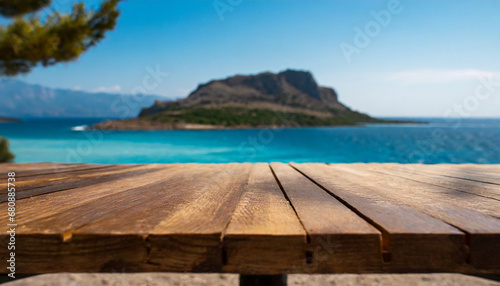 Wooden table on the blurred background of the sea. For product showing