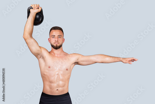 Strength workout, power sport. Confident sweat strong muscular millennial european man with naked torso