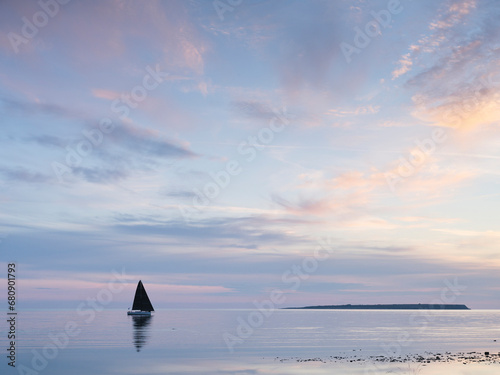 Yacht on sea during sunset