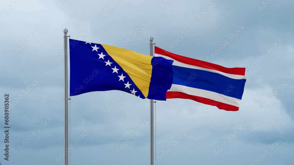 Kingdom of Thailand and Bosnia and Herzegovina flag waving together on cloudy sky, endless seamless loop, two country cooperation concept Kingdom of Thailand and Bosnia and Herzegovina flag waving together on cloudy sky, endless seamless loop, two country cooperation concept