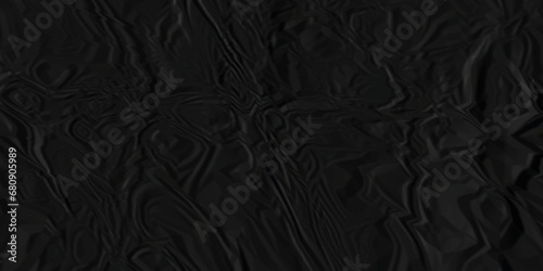 Dark black crumpled paper texture background. black crumpled and top view textures can be used for background of text or any contents.	