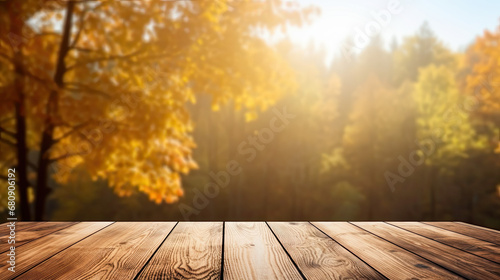 Empty wooden table over blurred autumn forest  Product Display  Mock up 