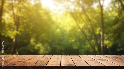 Empty wooden table over blurred spring forest, mock up, display, product display 