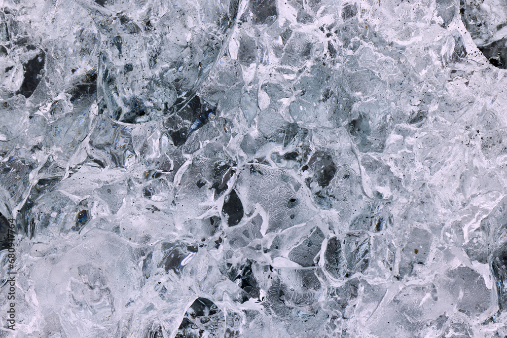 Abstract structure of a transparent block of ice. Graphic, monochrome background.