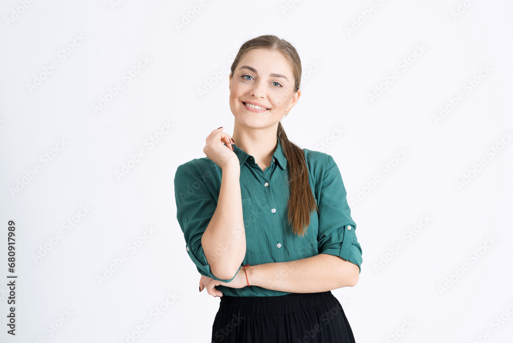 Portrait of attractive young woman. A businesswoman entrepreneur with a confident smile looks at camera isolated on a white studio background. Executive saleswoman Portrait of attractive young woman. A businesswoman entrepreneur with a confident smile looks at camera isolated on a white studio background. Executive saleswoman
