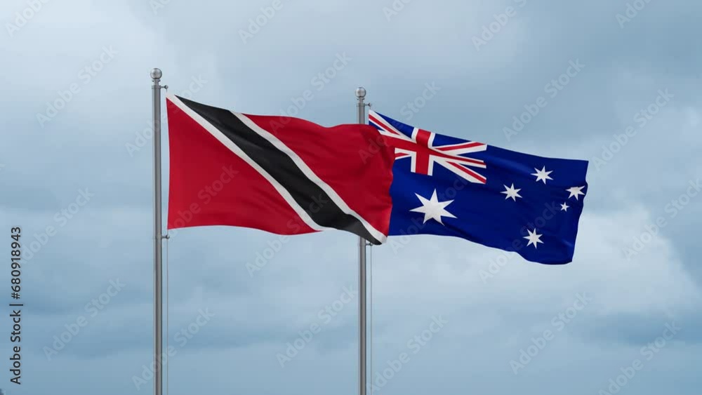 Australia flag and Trinidad and Tobago flag waving together on cloudy sky, endless seamless loop, two country relations concept Australia flag and Trinidad and Tobago flag waving together on cloudy sky, endless seamless loop, two country relations concept