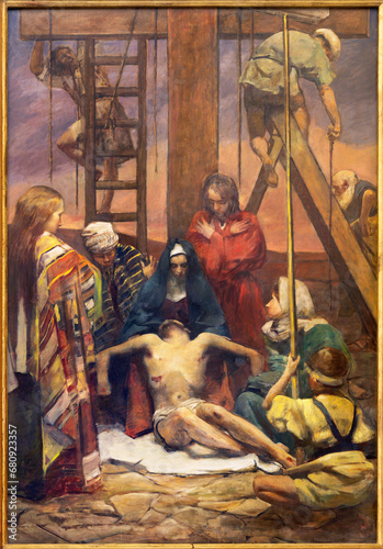 TREVISO, ITALY - NOVEMBER 8, 2023: The painting   Deposition of the Cross as the part of Cross way stations in the church La Cattedrale di San Pietro Apostolo by Alessandro Pomi (1947).