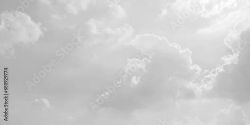 White cloud in the sky. View on a soft white fluffy cloud as background.  Cloudy sky, white clouds, black background pattern. The gray cloud trendy photo. White sky image  photo
