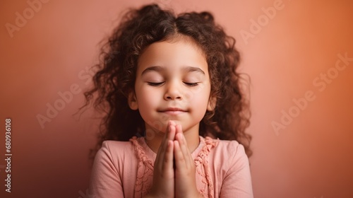 Child's Innocent Prayer: Little Girl with Hands Folded

