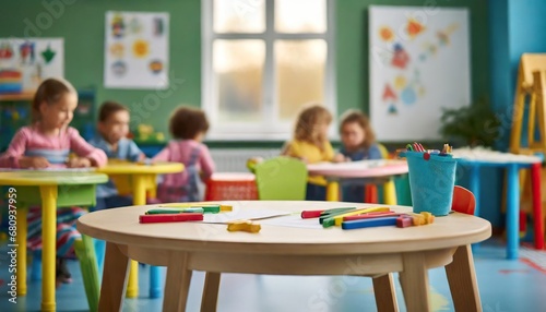  Playful Learning- An Empty Table in the Forefront of a Blurred Preschool Setting