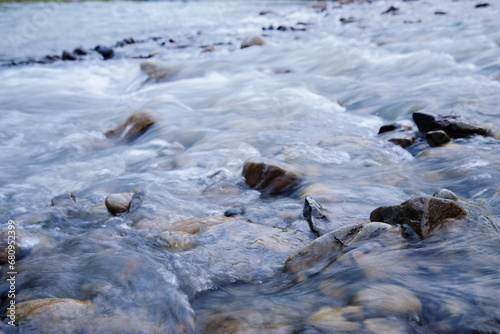 Fast stream river with wet stones