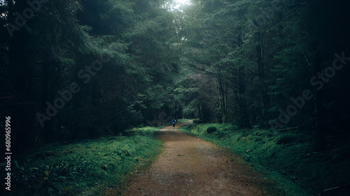 woman running in the forest
