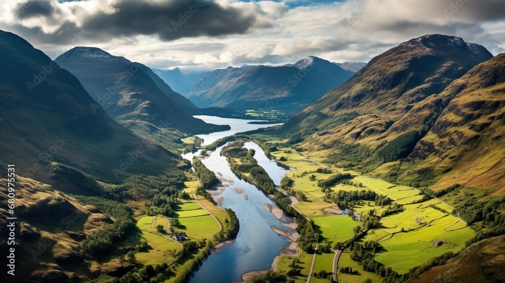 Fototapeta premium Aerial View of Glencoe and the Mountains Surrounding The Small Town in Scotland
