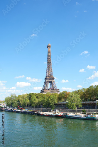 Eiffel tower in Paris during a sunny day .  Travel landmarks in Europe and France . © pascalkphoto