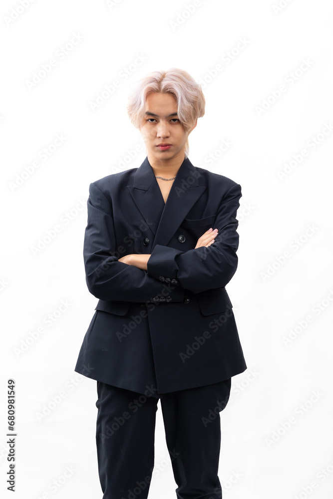 black suit and naked torso. Fashion portrait Asian young man. model, clothing and cosmetics. Young male model blond hair in fashionable clothing isolated on white background black suit and naked torso. Fashion portrait Asian young man. model, clothing and cosmetics. Young male model blond hair in fashionable clothing isolated on white background