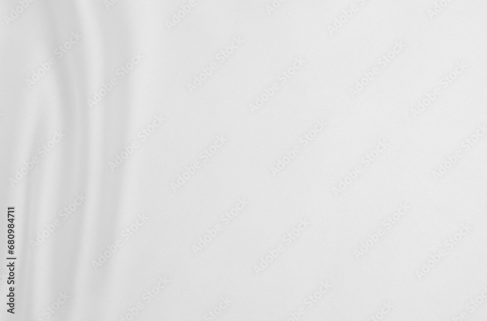 Obraz premium Smooth elegant white silk or satin luxury cloth texture as wedding background. Luxurious background design