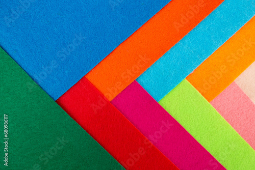 Multicolored felt fabric swatches, close up abstract texture