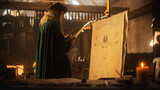 The Blend of Art and Science: Documentary Shot of Leonardo Da Vinci Working on his Famous Piece of the Vitruvian Man in his Workshop. Historical Moment Depiction of Talent and Brilliance