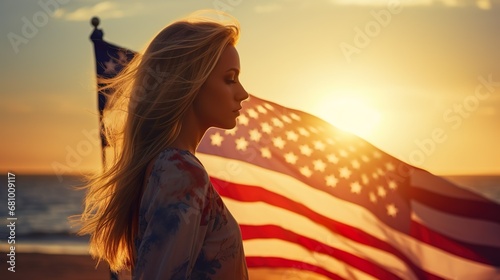 Smiling little girl waving a US flag at a parade