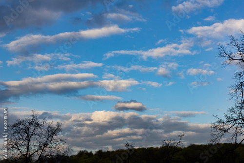 White cumulus clouds in blue sky