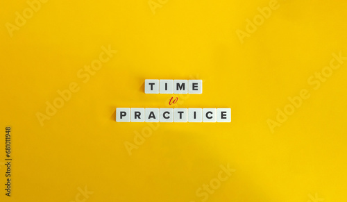Time to Practice Phrase on Letter Tiles on Yellow Background. Minimal Aesthetic. photo