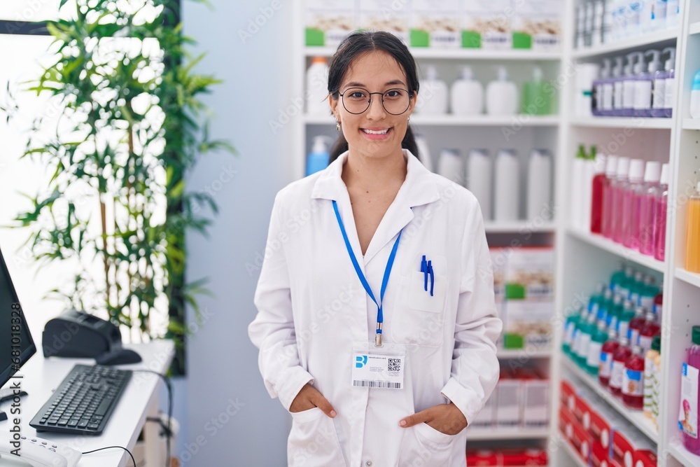 Young beautiful hispanic woman pharmacist smiling confident standing at pharmacy Young beautiful hispanic woman pharmacist smiling confident standing at pharmacy