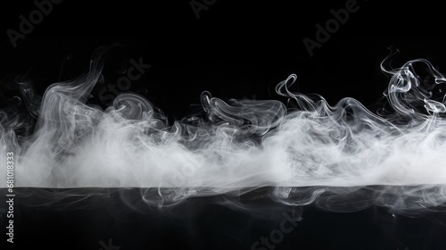 Close-up view of white water vapor with spray from the humidifier. Isolated on black background