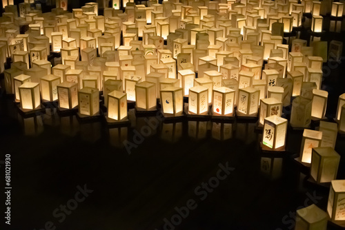 Paper Lanterns on Water as Asian evening event for festivity and celebration