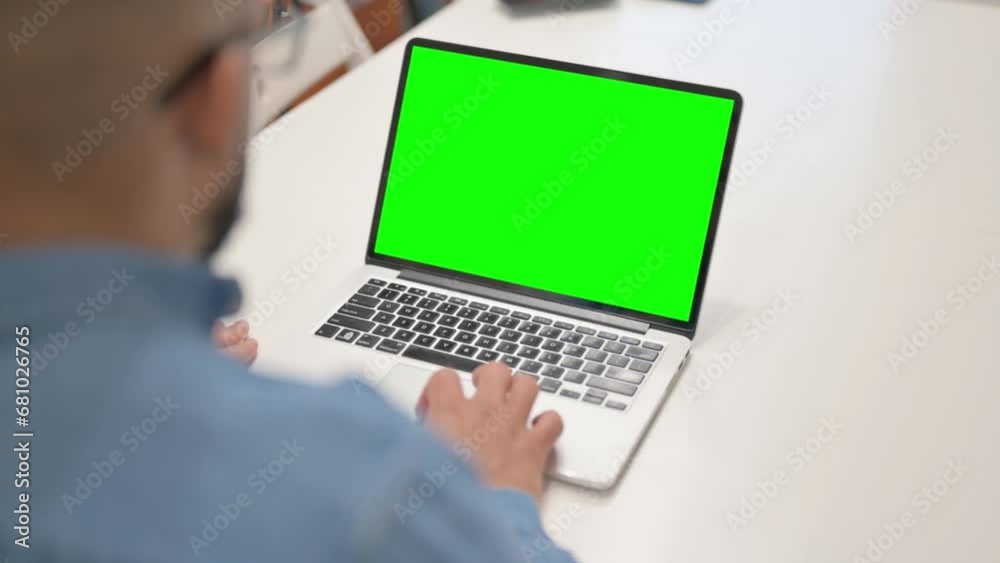 African Man Working on Laptop with Green Screen African Man Working on Laptop with Green Screen