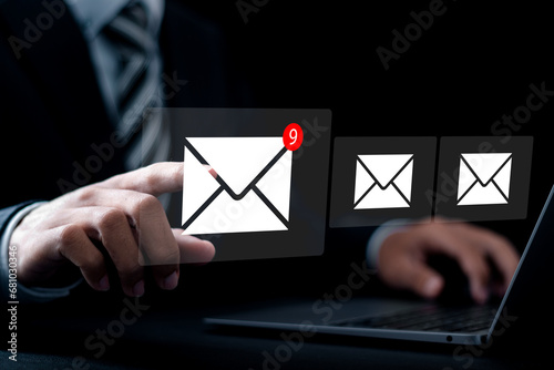 Businessman touch email symbol for receive new message. business email communication and digital marketing, newsletter, message, sms, electronic communication technology, new email notification.