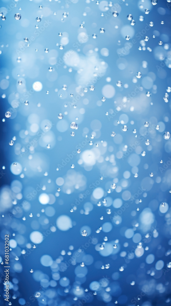 Falling snowflakes on a blue background. The concept is winter's serene beauty. Falling snowflakes on a blue background. The concept is winter's serene beauty.
