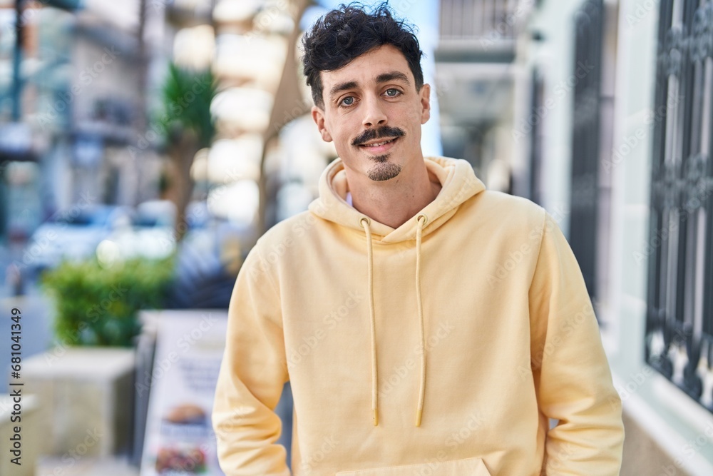 Young caucasian man smiling confident standing at street Young caucasian man smiling confident standing at street
