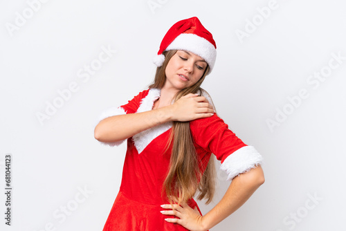Young caucasian woman dressed as mama noel isolated on white background suffering from pain in shoulder for having made an effort
