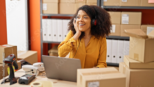 African american woman ecommerce business worker having video call at office photo