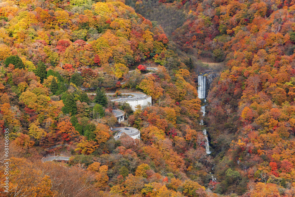 Scenery of serpentine road and waterfall in autumn. viewed from Akechidaira Ropeway, Nikko, Tochigi, Japan