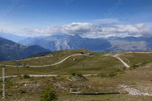 Summer view of the Valloire - Galibier Thabor Ski Area, in the Savoie region of the French Alps. A popular winter resort captured here with no snow and empty chairlifts. photo