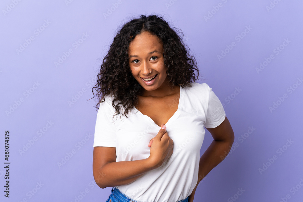 Teenager cuban girl isolated on purple background with surprise facial expression Teenager cuban girl isolated on purple background with surprise facial expression