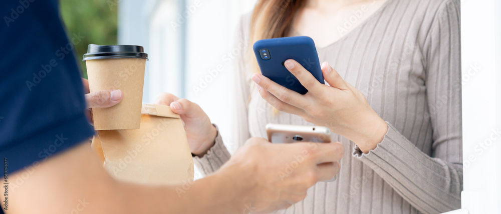 Happy smile Asian woman scan QR code for pay of food. Delivery man send deliver express. online shop, paper container, takeaway, postman, delivery service, packages, electronic money, Digital transfer