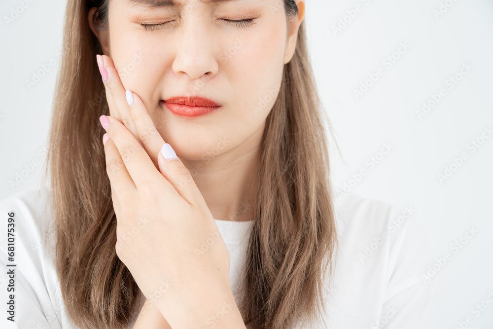 Asian woman feel toothache from gingivitis, female suffer tooth, decay problems, dental care. sensitive tooth, decay problem, bad breath, Gingival Recession, Oral Hygiene instruction, tooth extraction Asian woman feel toothache from gingivitis, female suffer tooth, decay problems, dental care. sensitive tooth, decay problem, bad breath, Gingival Recession, Oral Hygiene instruction, tooth extraction
